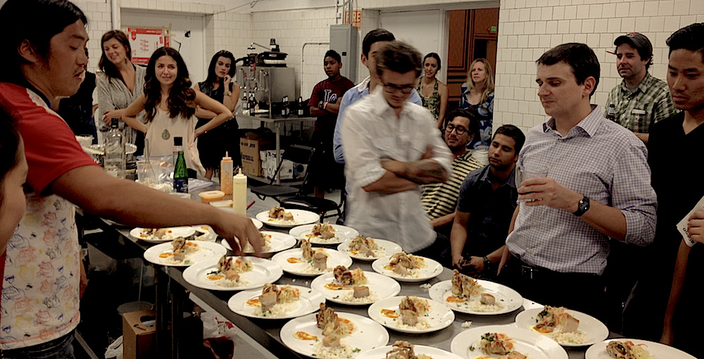 DTLA Nation members gathered around a community dinner